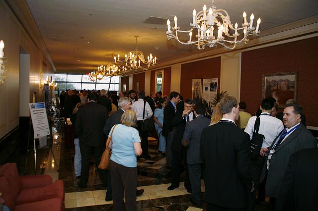 Participants mingle during a break at the Space Venture Finance Symposium, a part of the International Space Development Conference