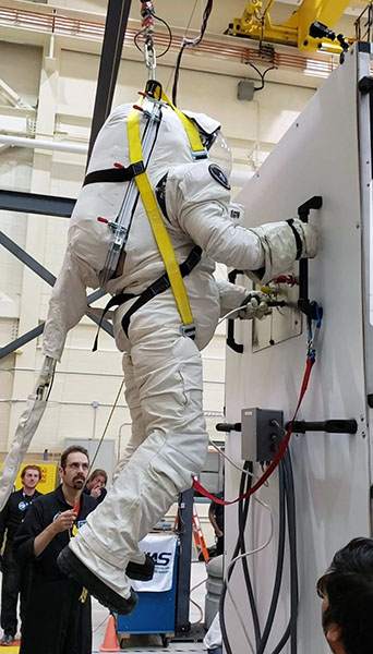 Shawna Pandya testing a space suit