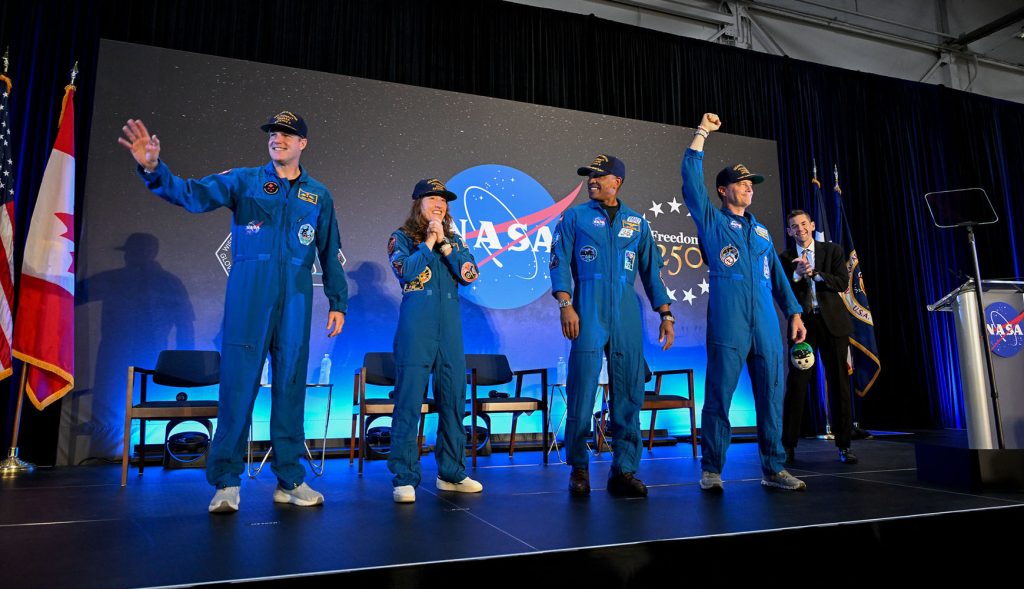 Astronauts return to Houston