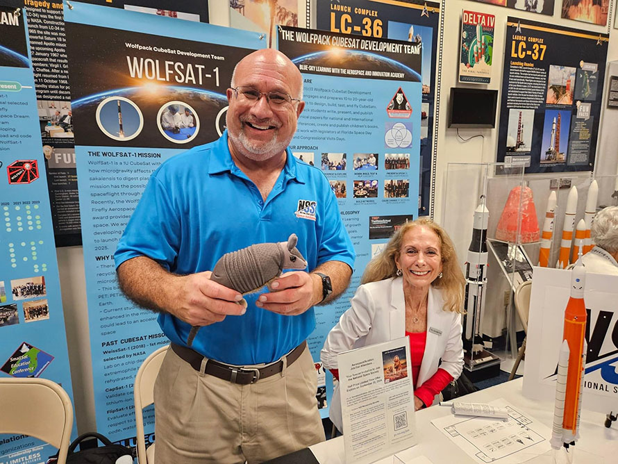 Burt Dicht and Elizabeth Schneider at NSS table